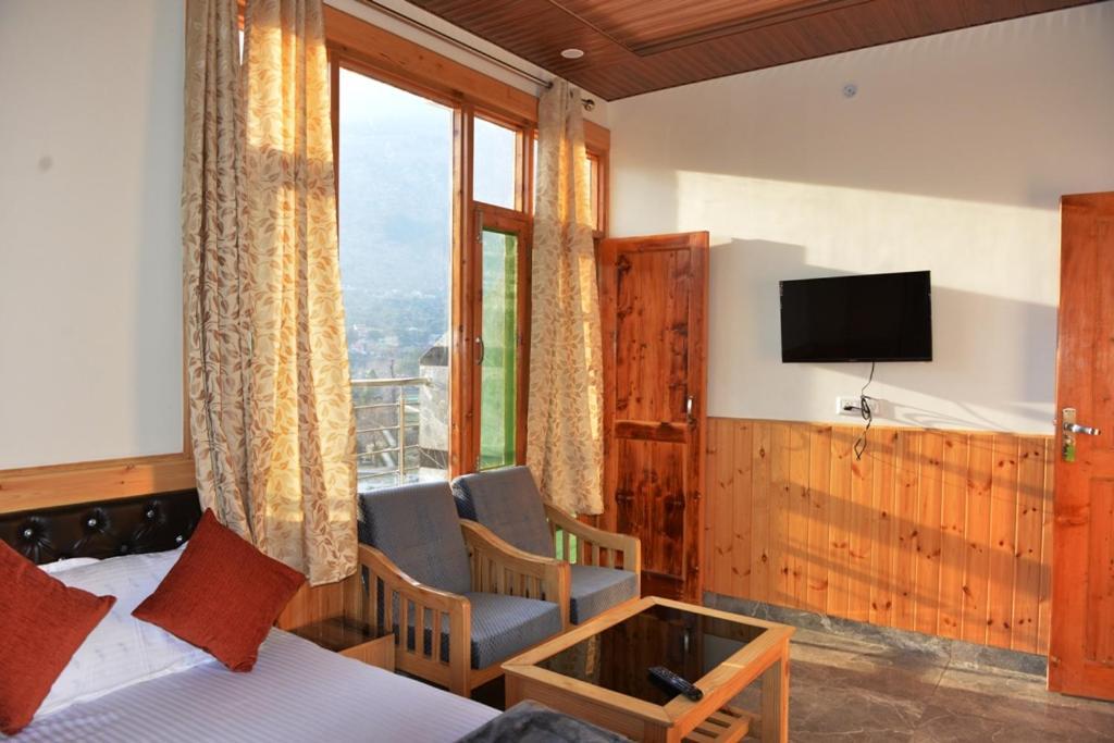 Tulip Flowing River View Hotel. Shamshi Exterior photo